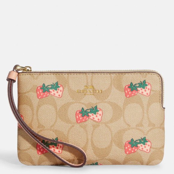 Coach Handbags - COACH Corner Zip Wristlet In Signature Canvas With Strawberry Print